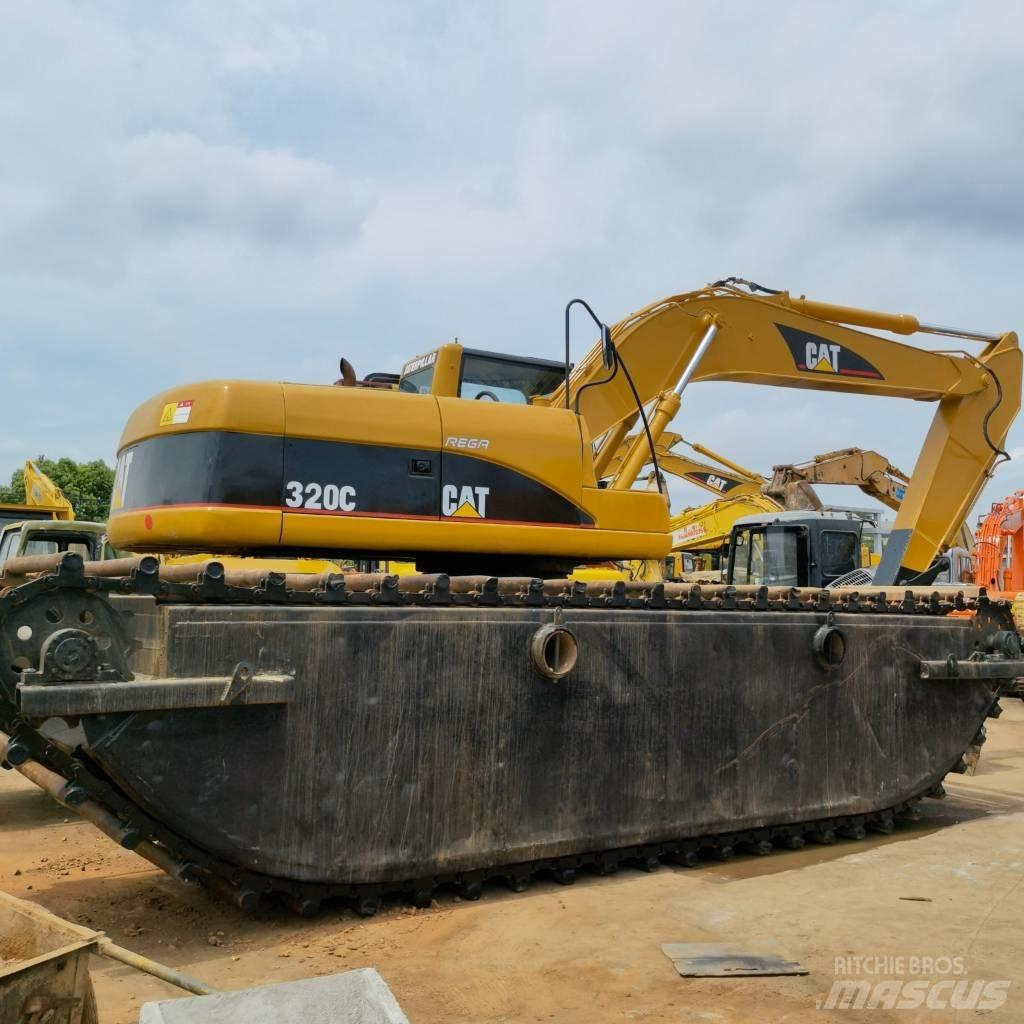 CAT 320 C Багери амфибии