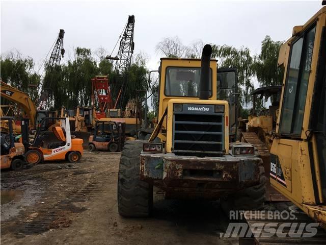 Komatsu WA360 Товарач със заден ексватор