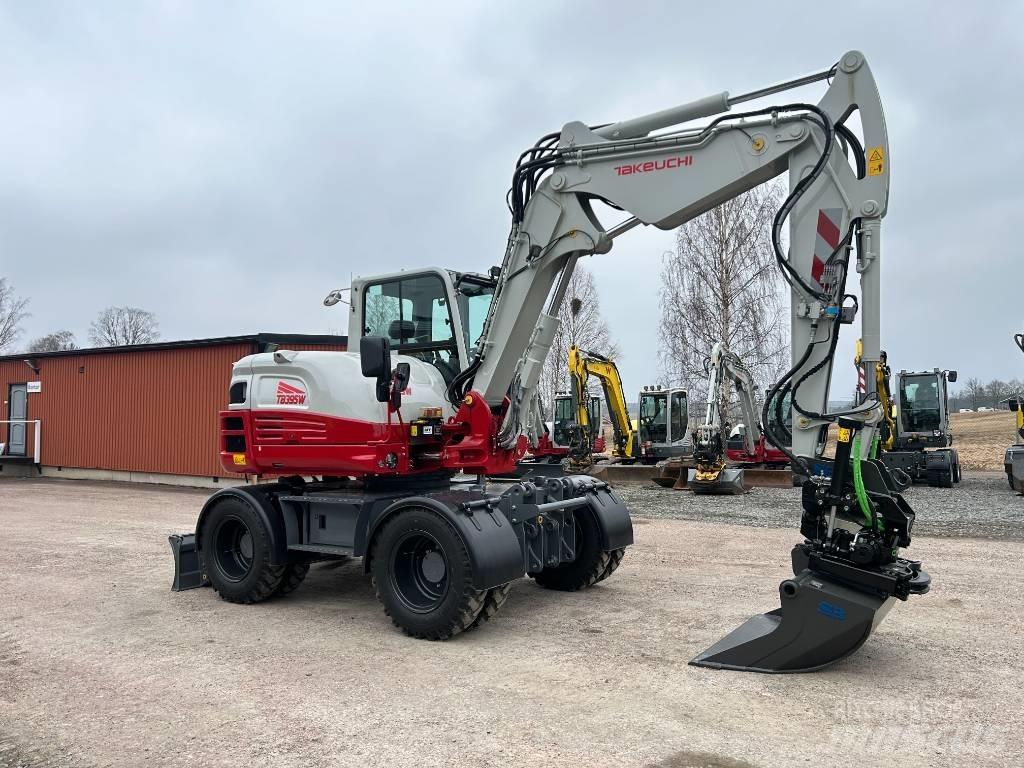 Takeuchi TB395W Колесни екскаватори