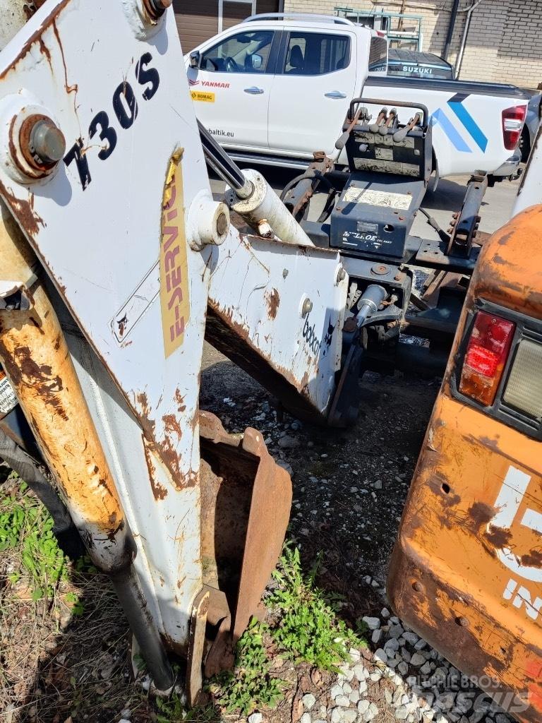 Bobcat S750 Товарачи със заден ескаватор