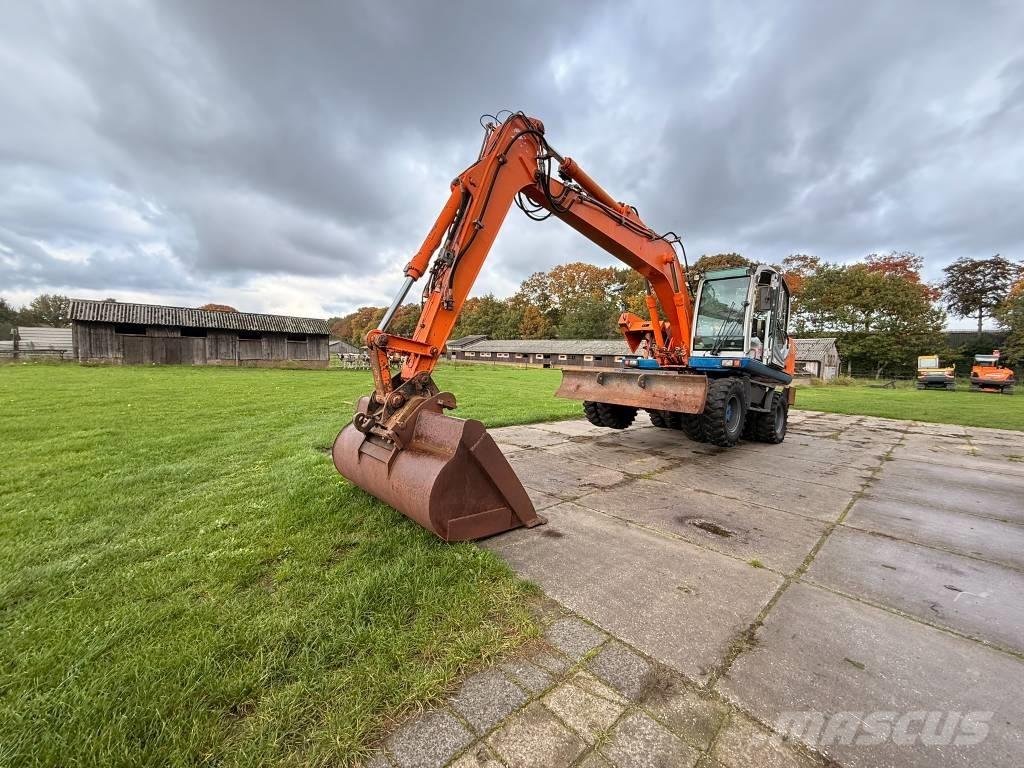 Atlas terex Екскаватори