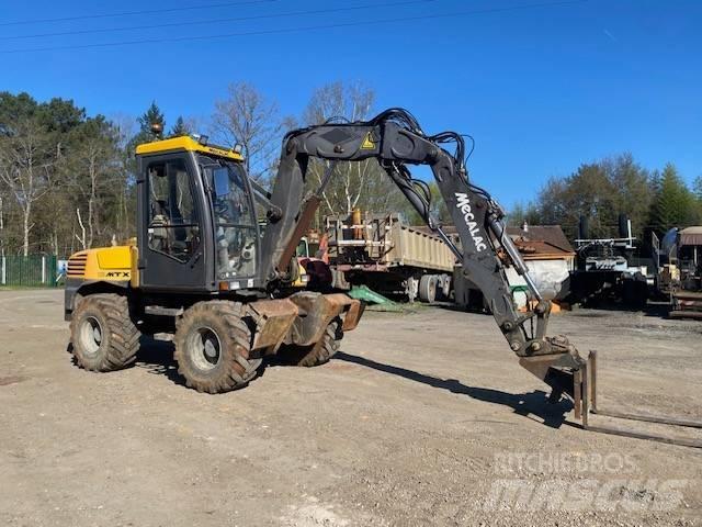 Mecalac 12 M TX Колесни екскаватори