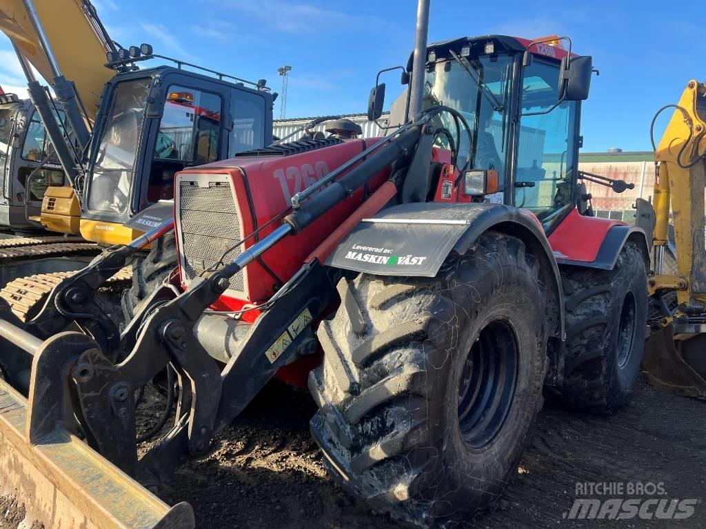 Huddig 1260 Товарач със заден ексватор