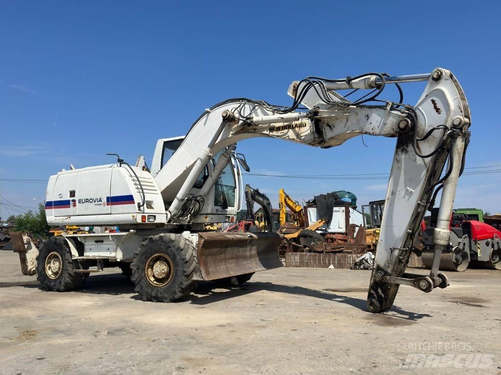 New Holland MH Plus Колесни екскаватори