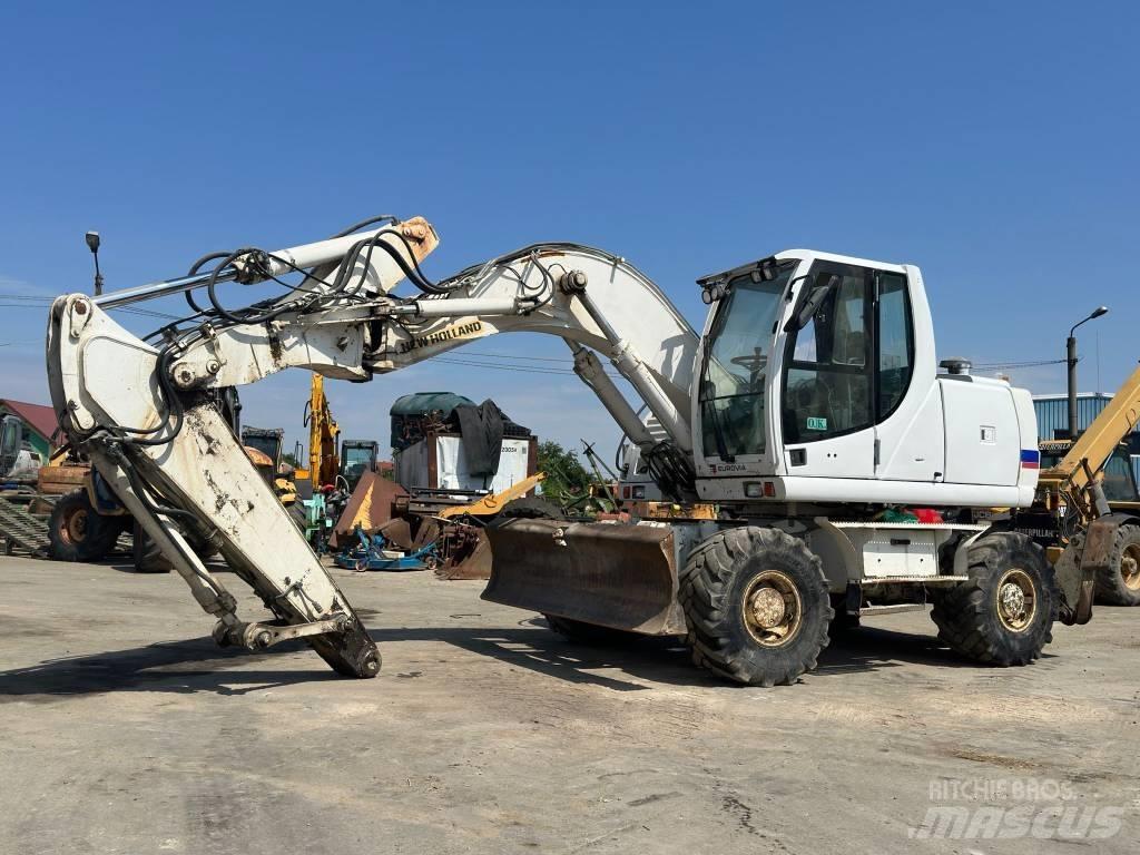 New Holland MH Plus Колесни екскаватори