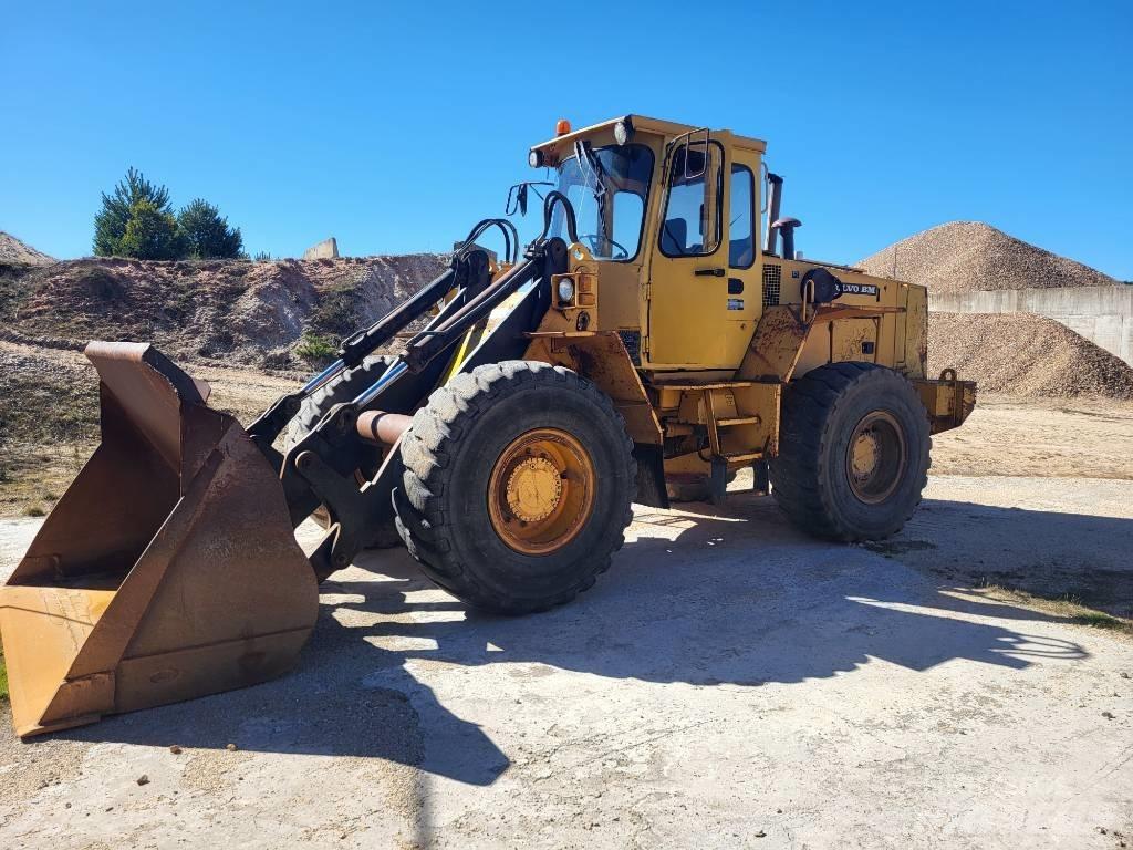  Cargadora volvo L90 Мини товарачи