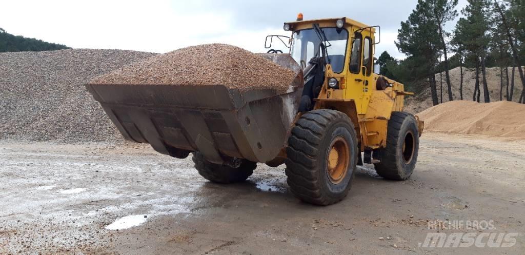  Cargadora volvo L90 Мини товарачи