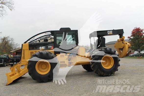 CAT 545C Скидери
