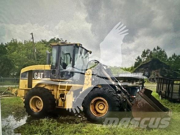 CAT IT28G Колесни товарачи