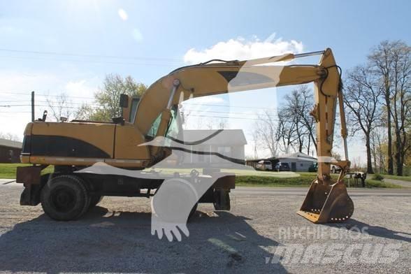 CAT M318C Колесни екскаватори
