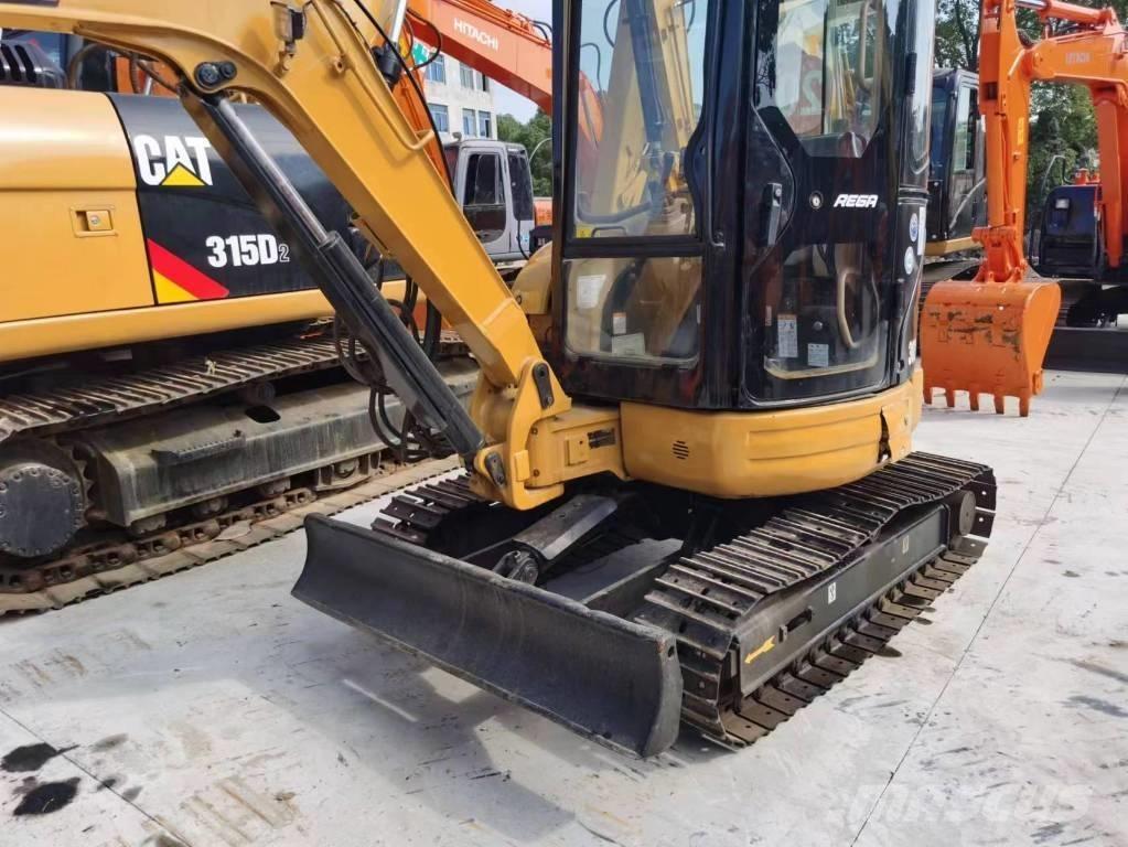 CAT 303 CR Мини екскаватори < 7 т