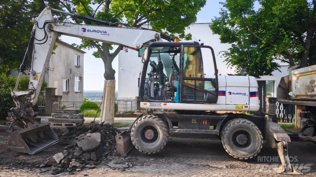 CAT 313 D Колесни екскаватори