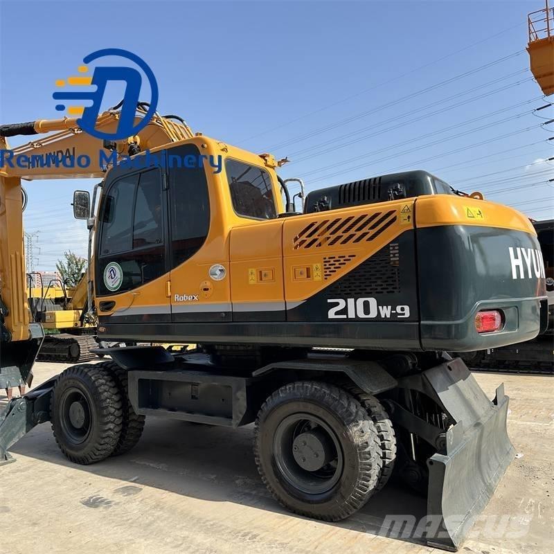 Hyundai 210W-9 Колесни екскаватори