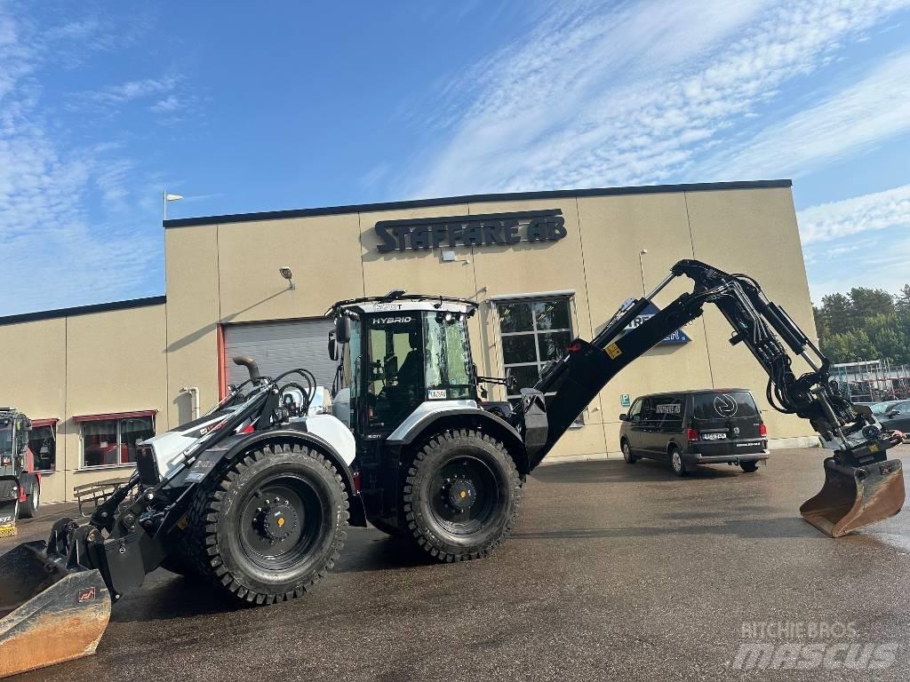 Huddig 1370T TIGON Товарач със заден ексватор