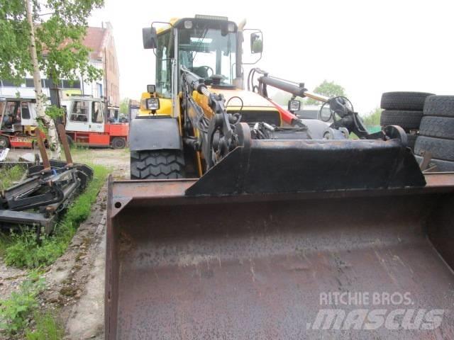Huddig 1060 1060 Товарач със заден ексватор