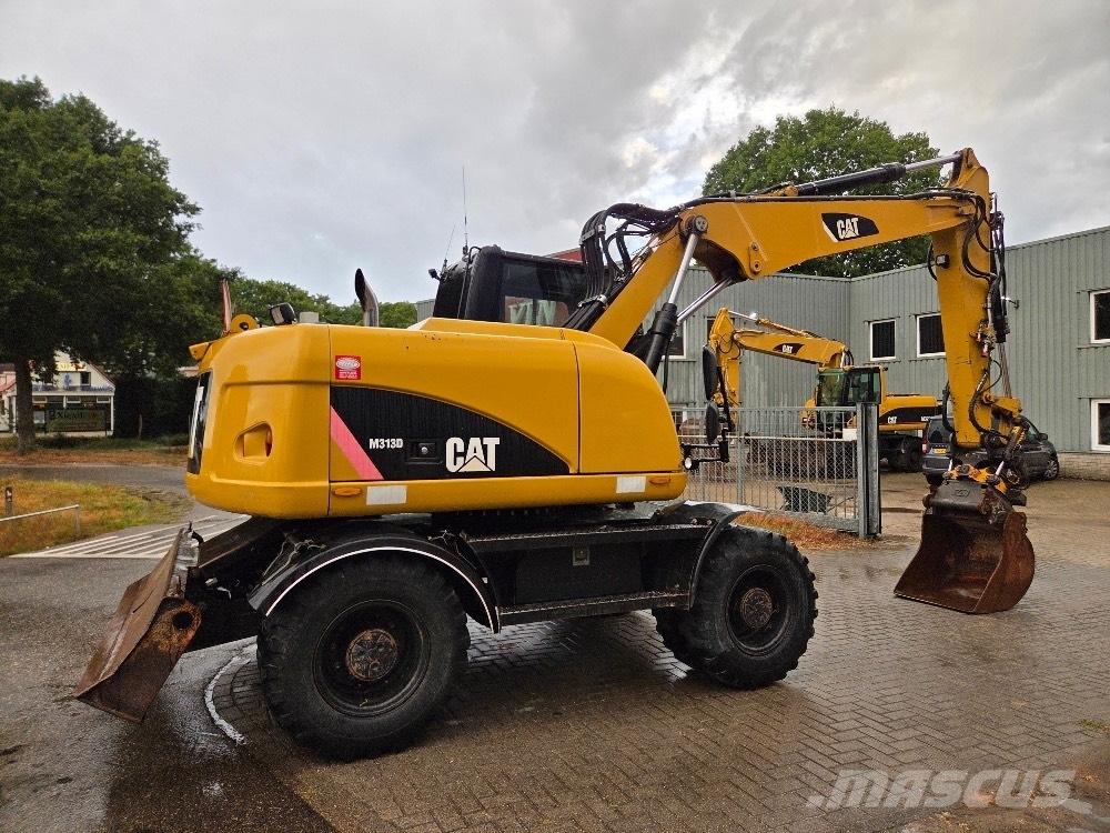 CAT M313D Колесни екскаватори