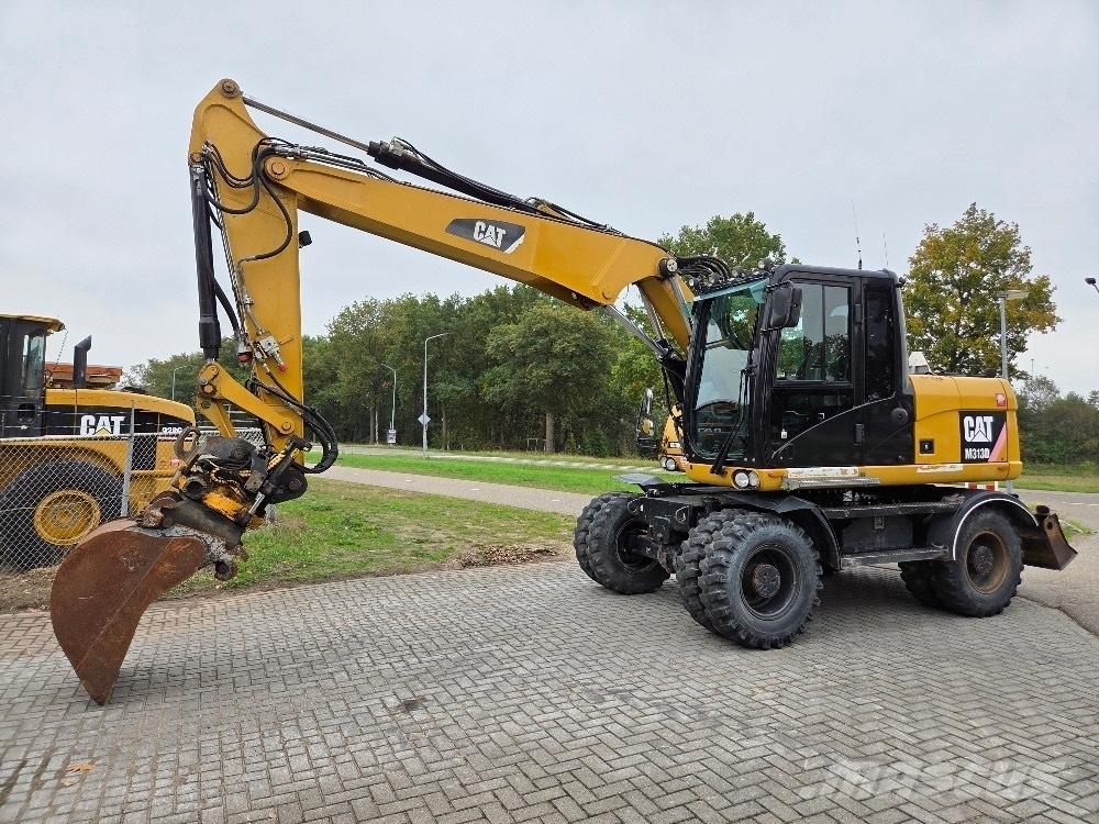 CAT M313D Колесни екскаватори