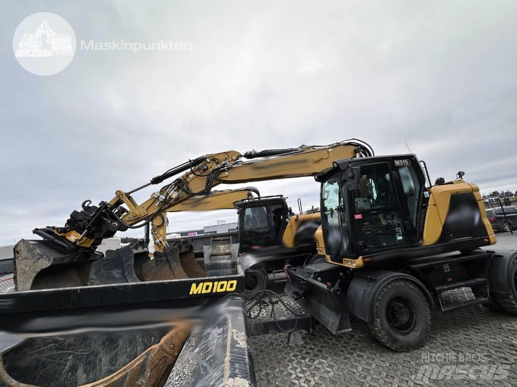 CAT M 315 Колесни екскаватори