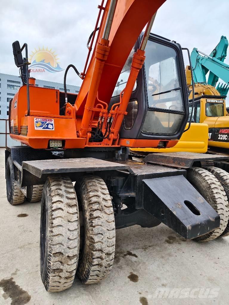 Hitachi EX 100 W D Колесни екскаватори