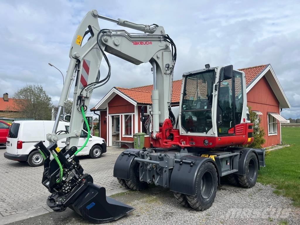 Takeuchi TB 395 W Колесни екскаватори