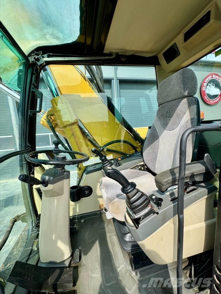CAT M 318 C Колесни екскаватори