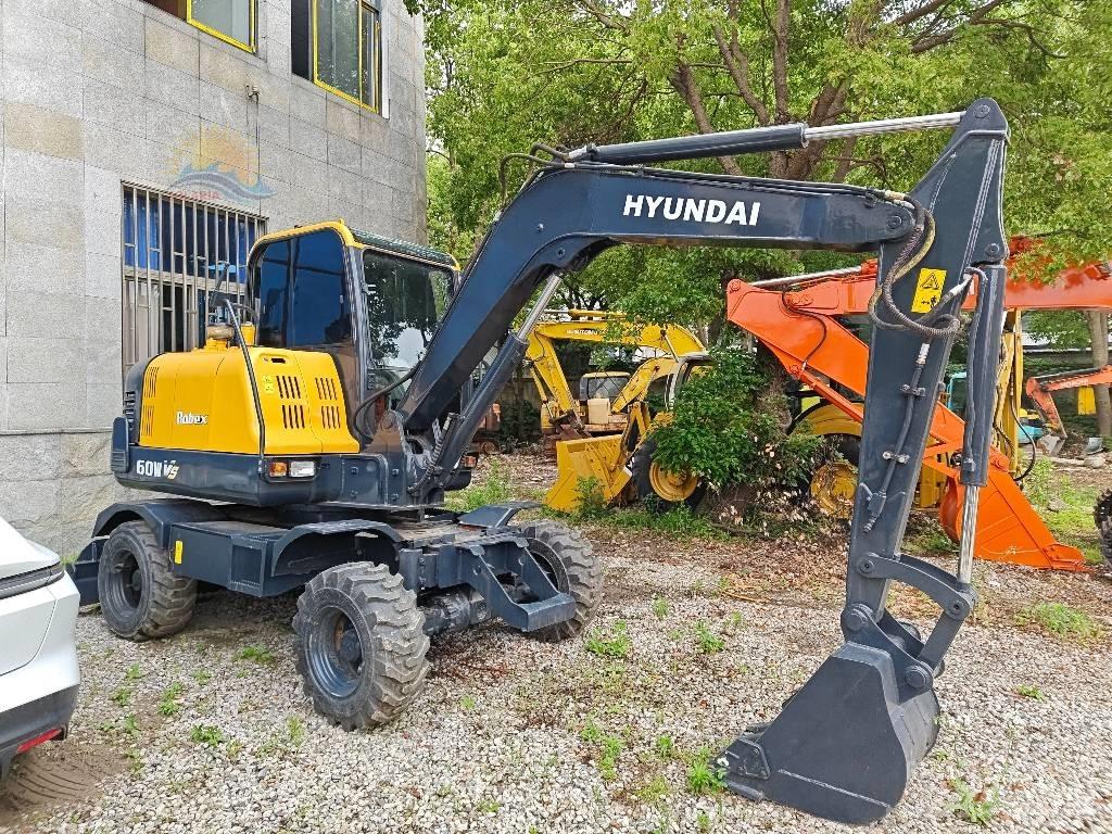 Hyundai R 60W Колесни екскаватори