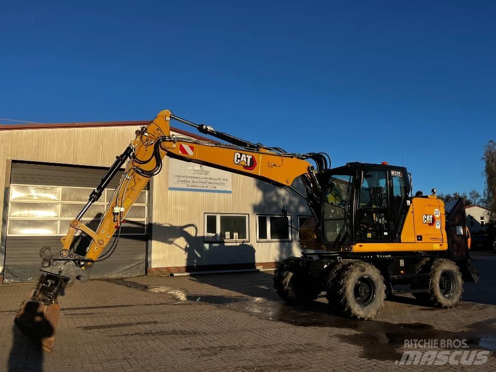 CAT M 315 Колесни екскаватори