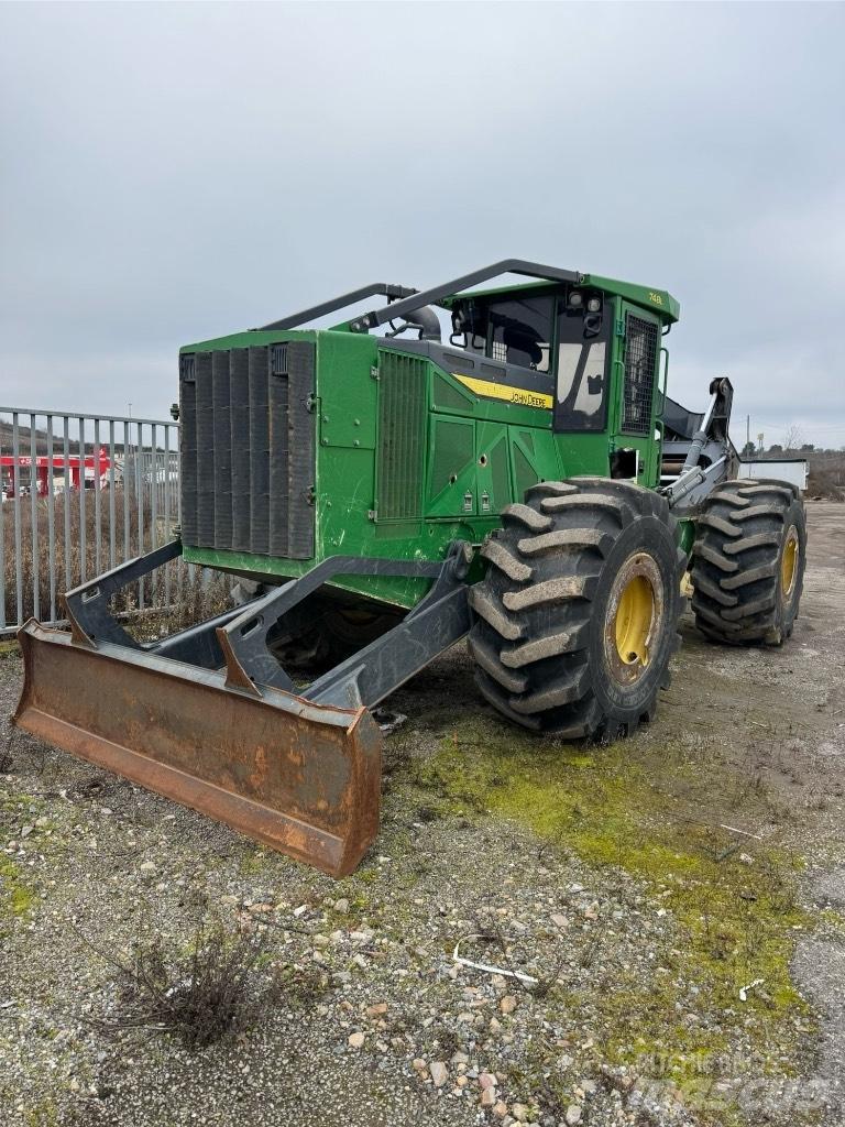 John Deere 748 Скидери
