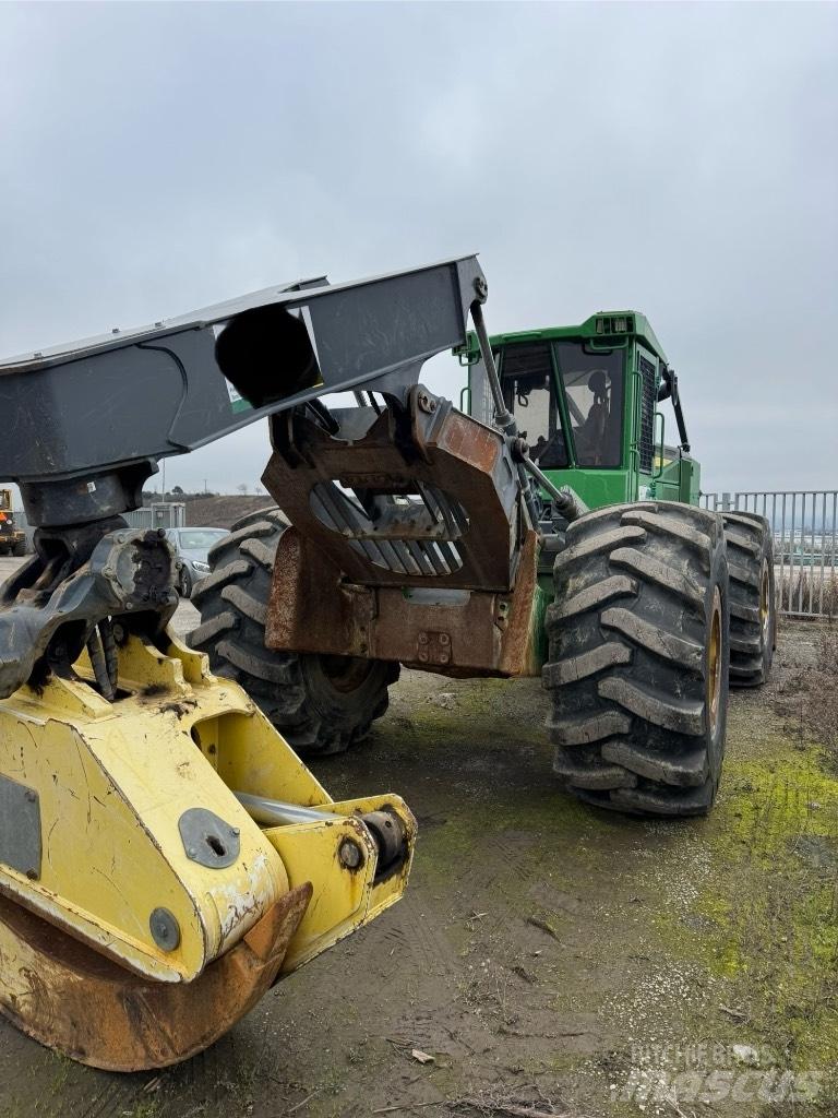 John Deere 748 Скидери
