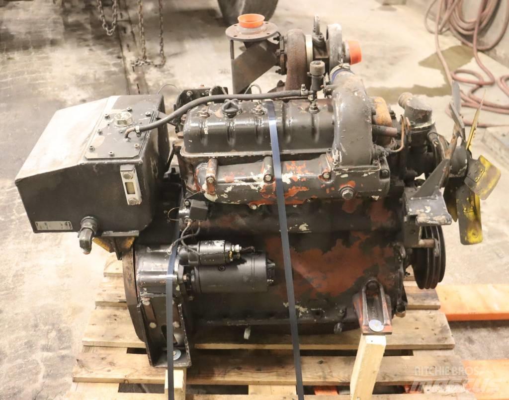 Huddig 960 Товарач със заден ексватор