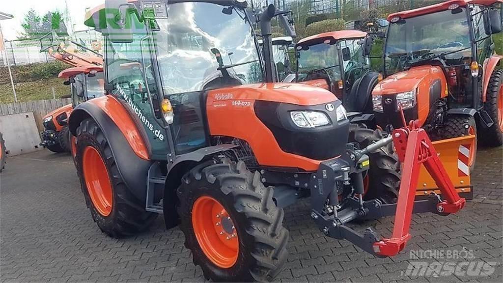 Kubota m4073 cab Трактори