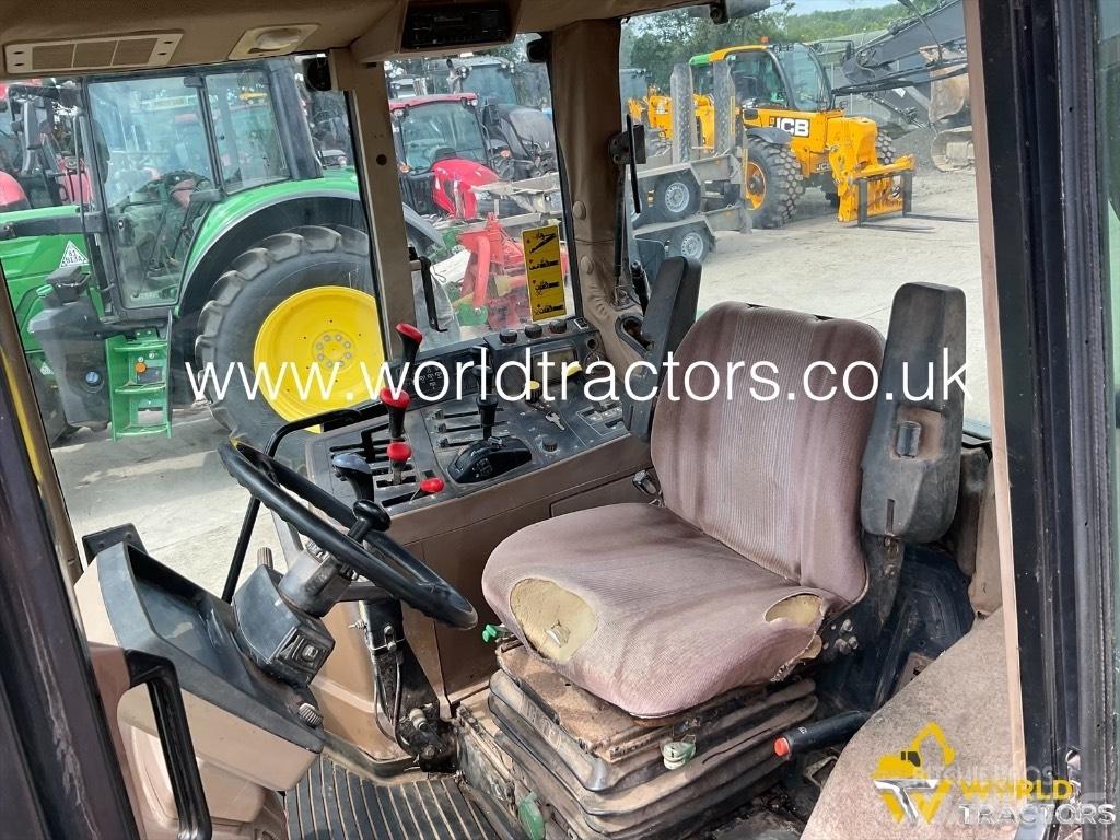 John Deere 6400 Трактори