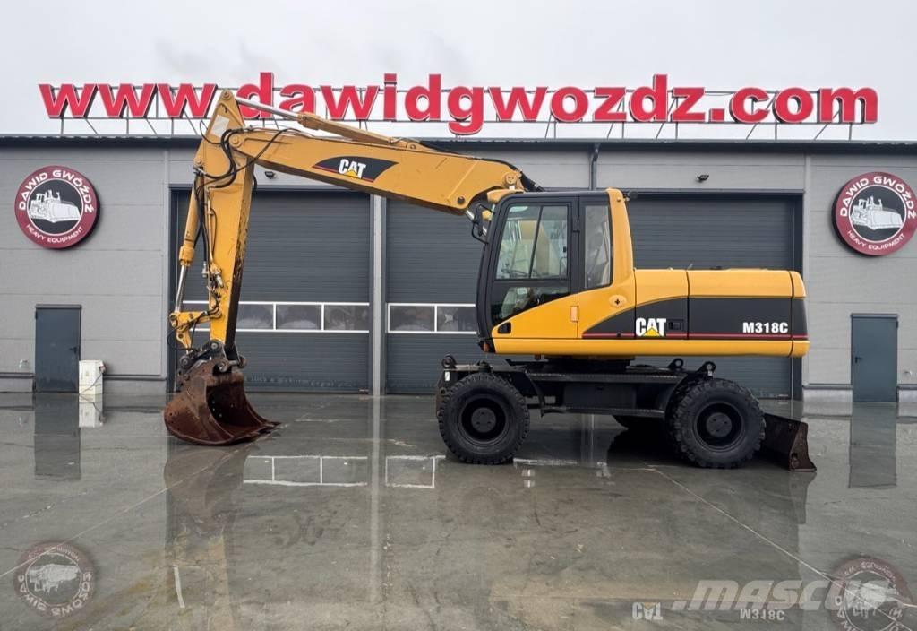 CAT M 318 C Колесни екскаватори