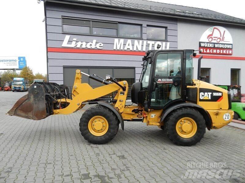 CAT ( CAT ) 906M Колесни товарачи