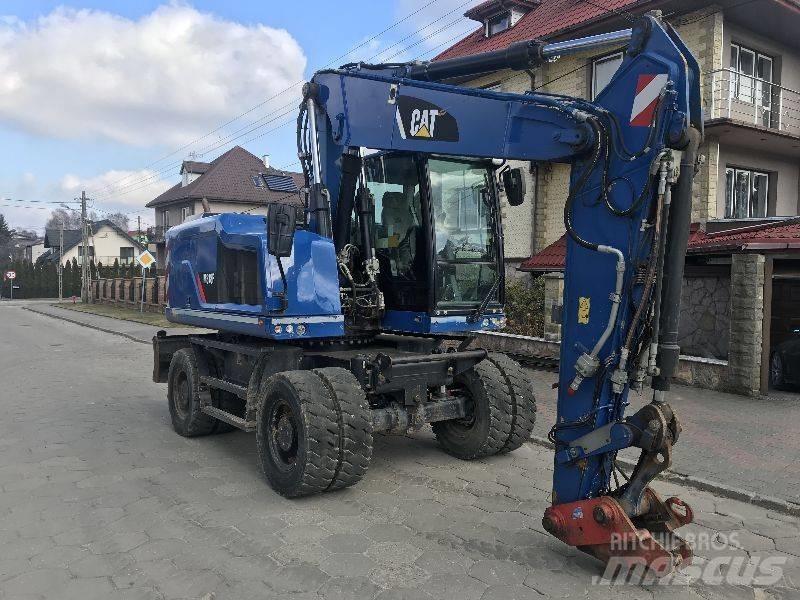 CAT M318f 318 f Колесни екскаватори