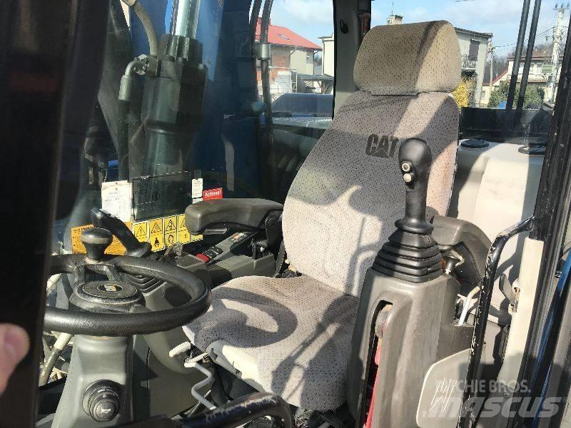 CAT M318f 318 f Колесни екскаватори