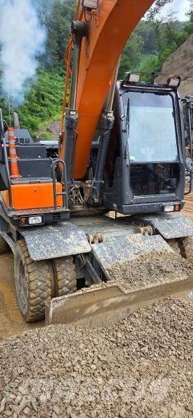 Doosan D 140W-5 Колесни екскаватори