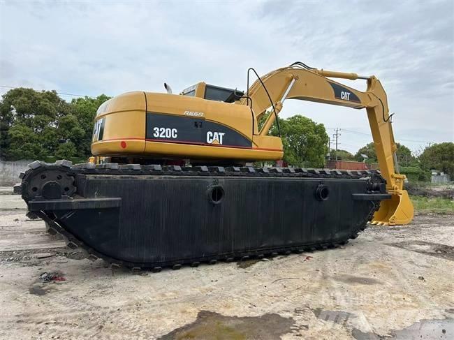 CAT 320 C Багери амфибии
