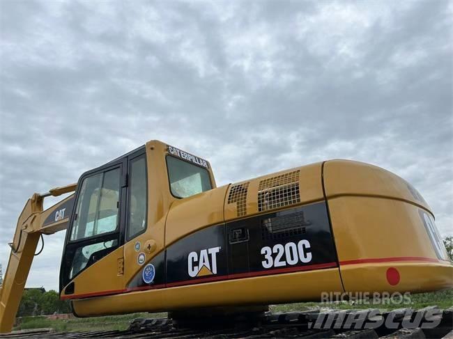 CAT 320 C Багери амфибии