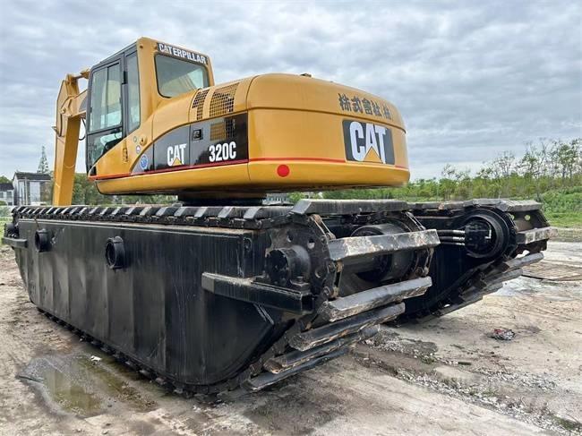 CAT 320 C Багери амфибии