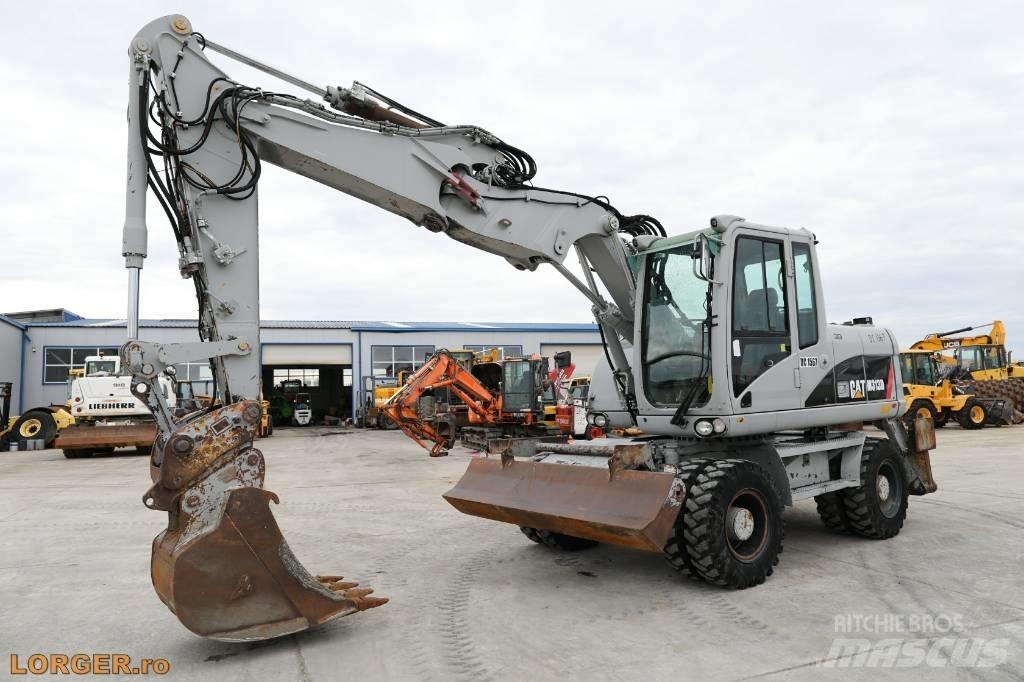 CAT M 313 D Колесни екскаватори