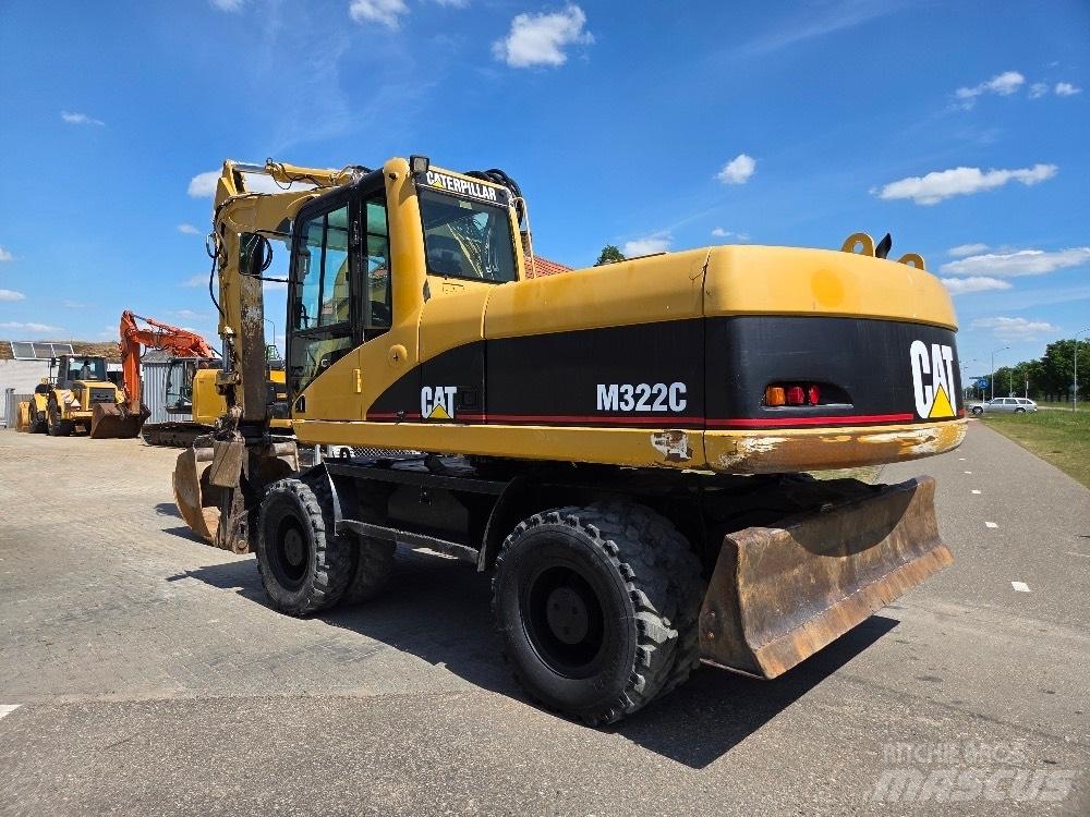 CAT M322C Колесни екскаватори
