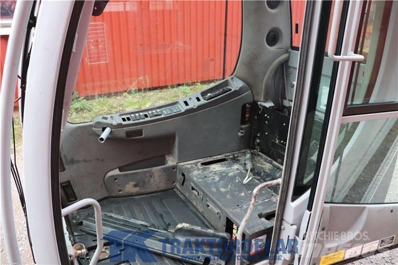 New Holland WE150C Кабина