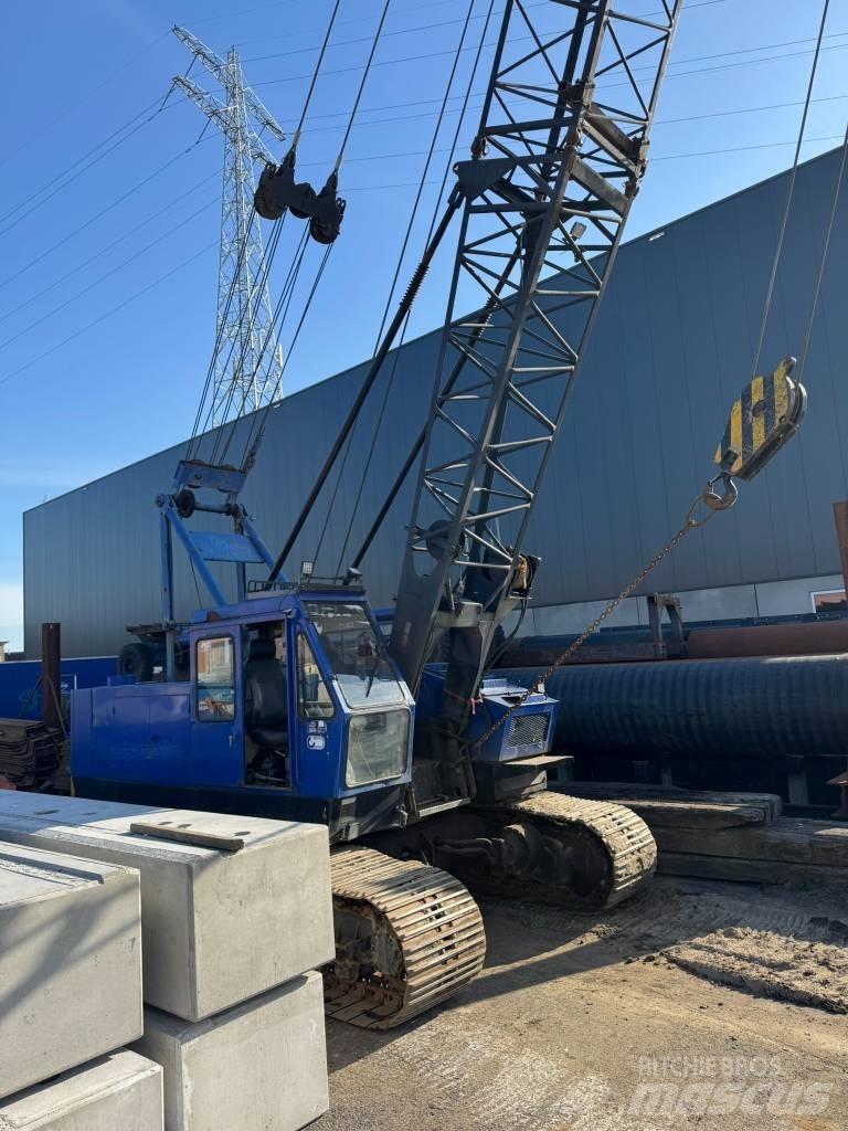 Hitachi KH 100 Верижни кранове
