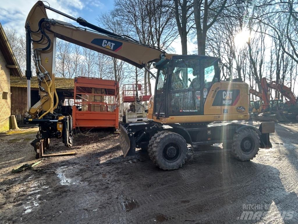 CAT M315 Колесни екскаватори