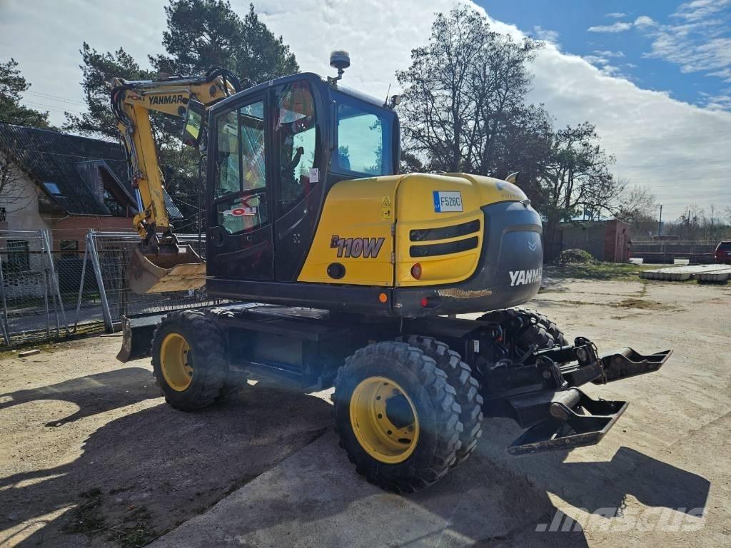 Yanmar B 110 W Товарач със заден ексватор