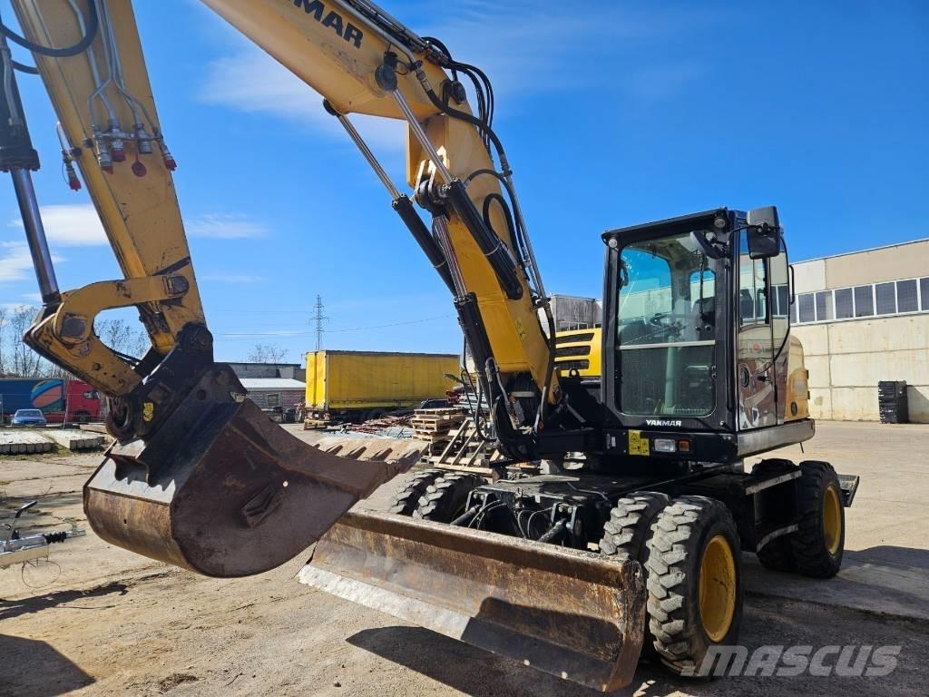 Yanmar B 110 W Товарач със заден ексватор