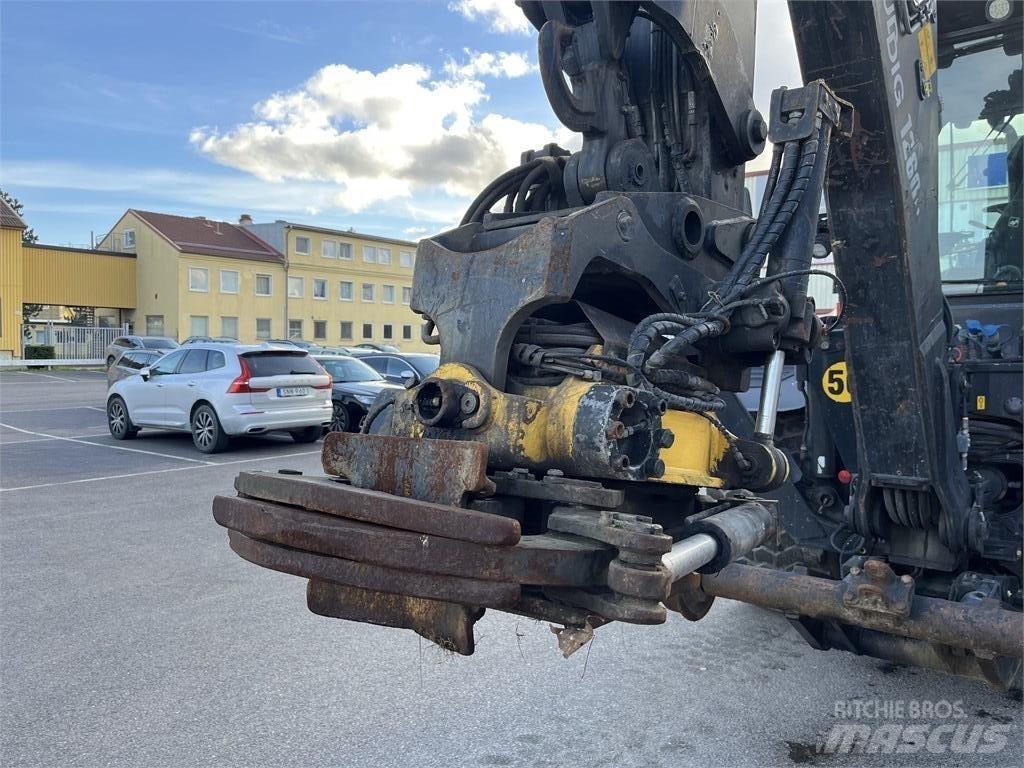 Huddig 1260 B Rail Товарач със заден ексватор