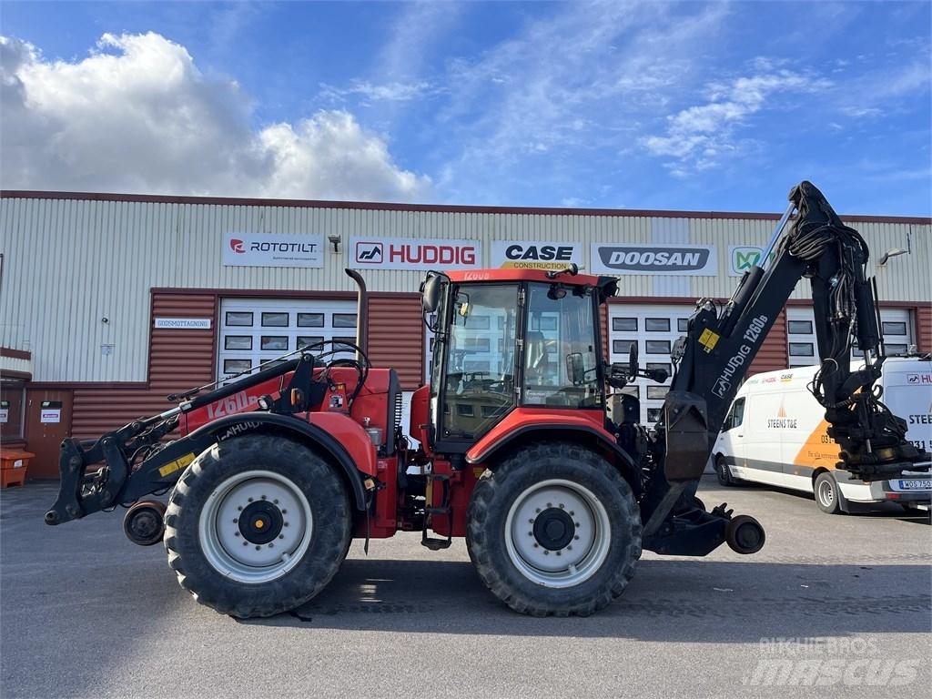 Huddig 1260 B Rail Товарач със заден ексватор