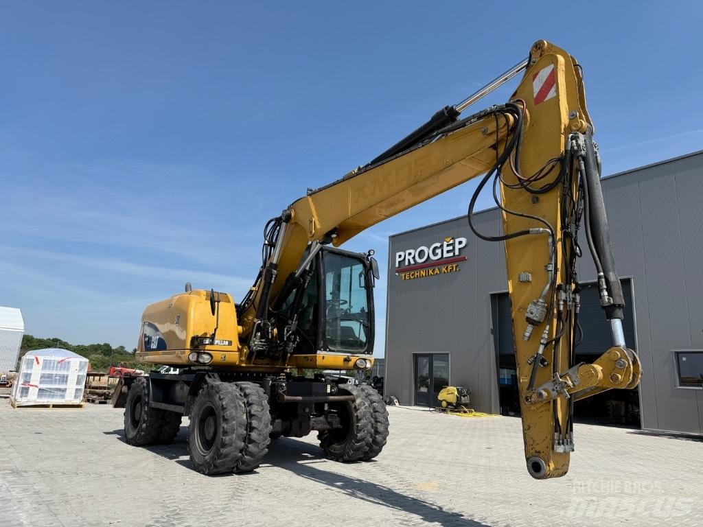CAT M 313 D VAH Колесни екскаватори